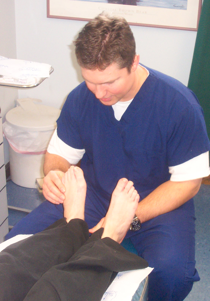 Dr. Fosdick examines feet